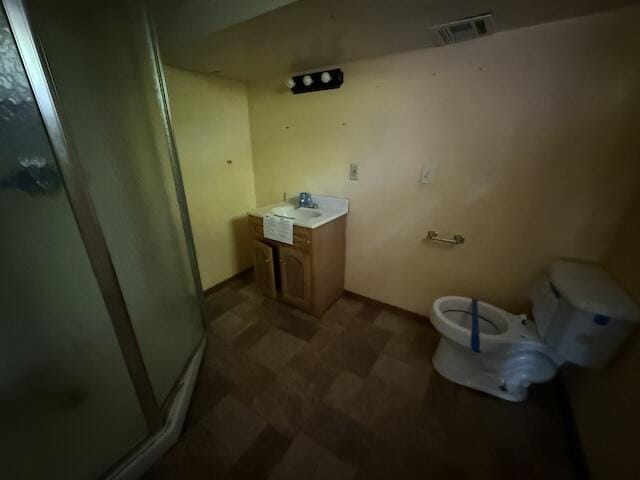 315 Della Winchester Rd, Nancy, KY 42544 - bathroom with toilet, a shower stall, vanity, and tile patterned floors