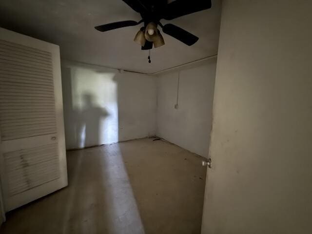 315 Della Winchester Rd, Nancy, KY 42544 - unfurnished bedroom with concrete floors and a ceiling fan