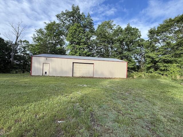 315 Della Winchester Rd, Nancy, KY 42544 - view of pole building featuring a lawn