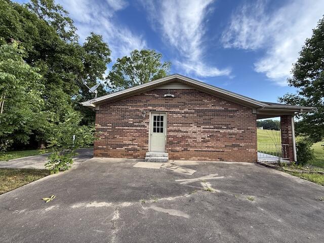 315 Della Winchester Rd, Nancy, KY 42544 - view of property exterior with brick siding