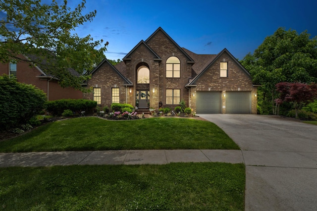 1304 Wakehurst Ct, Lexington, KY 40509 - view of front of house featuring driveway, brick siding, and a front lawn