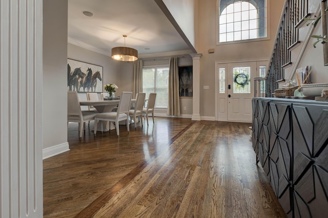 1304 Wakehurst Ct, Lexington, KY 40509 - entryway featuring healthy amount of natural light, baseboards, dark wood finished floors, and crown molding
