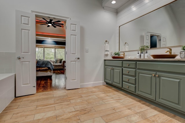 1304 Wakehurst Ct, Lexington, KY 40509 - full bathroom with double vanity, wood finished floors, ensuite bath, and a ceiling fan