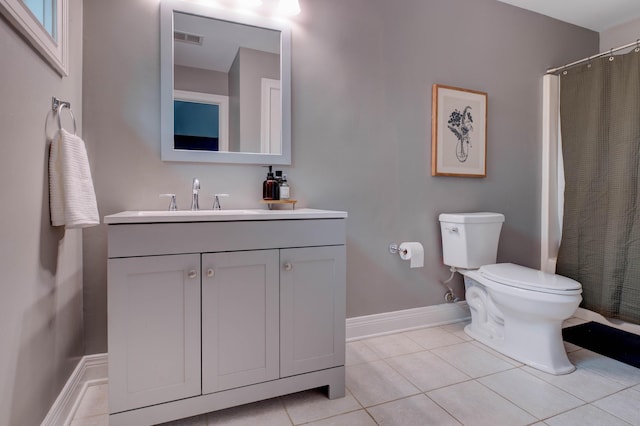 1304 Wakehurst Ct, Lexington, KY 40509 - full bathroom featuring toilet, vanity, tile patterned flooring, and a shower with curtain