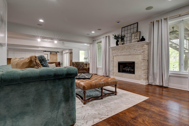 1304 Wakehurst Ct, Lexington, KY 40509 - living room featuring wood finished floors, a fireplace, healthy amount of natural light, recessed lighting, and baseboards