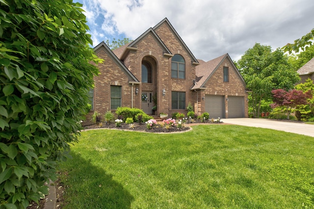 1304 Wakehurst Ct, Lexington, KY 40509 - traditional home with brick siding, concrete driveway, and a front yard
