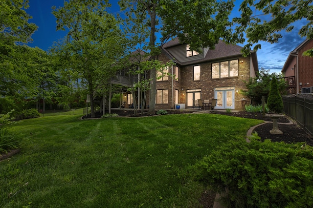 1304 Wakehurst Ct, Lexington, KY 40509 - back of property with brick siding and french doors