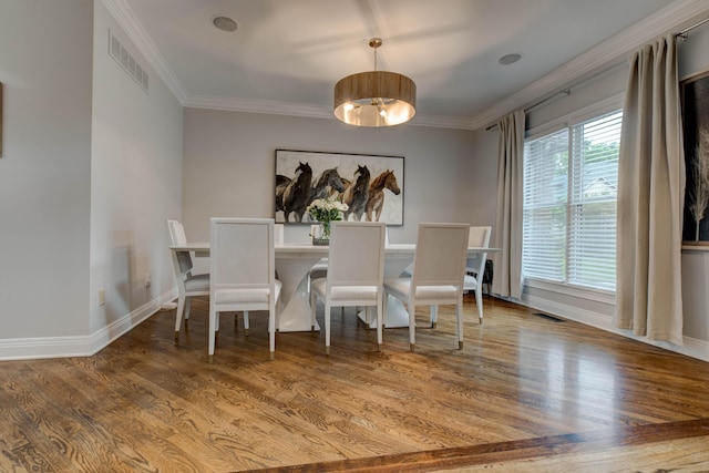 1304 Wakehurst Ct, Lexington, KY 40509 - dining space featuring ornamental molding, wood finished floors, and baseboards
