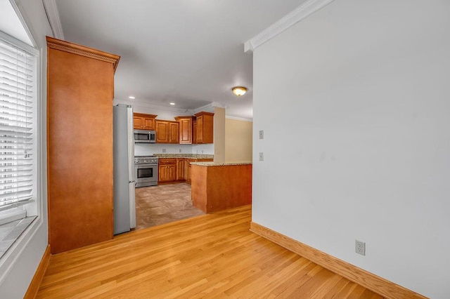 400 Redding Rd # 2, Lexington, KY 40517 - kitchen featuring stainless steel appliances, crown molding, light wood-style floors, brown cabinetry, and baseboards