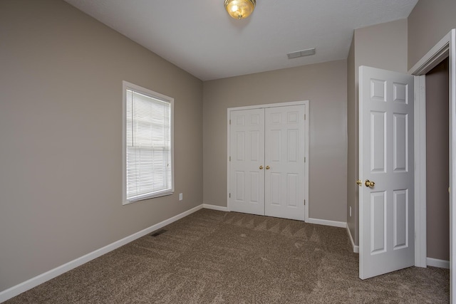164 Strawberry Fields Rd, Lexington, KY 40516 - unfurnished bedroom featuring carpet, a closet, and baseboards