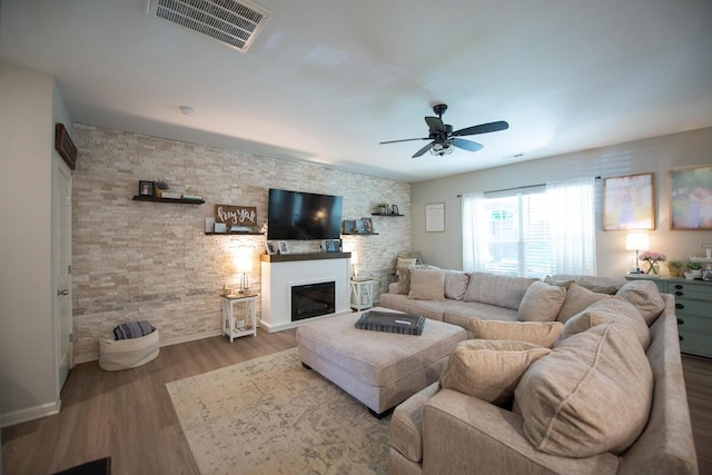 133 Kirkstall Way, Georgetown, KY 40324 - living room featuring a fireplace, ceiling fan, baseboards, and wood finished floors