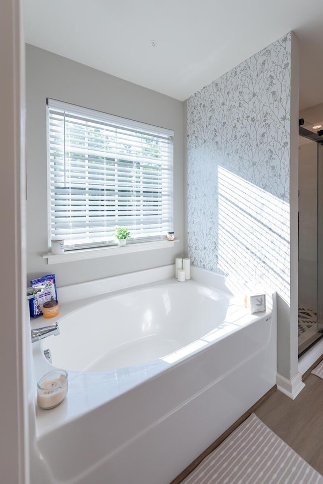 133 Kirkstall Way, Georgetown, KY 40324 - full bathroom featuring a shower stall, a garden tub, and wood finished floors
