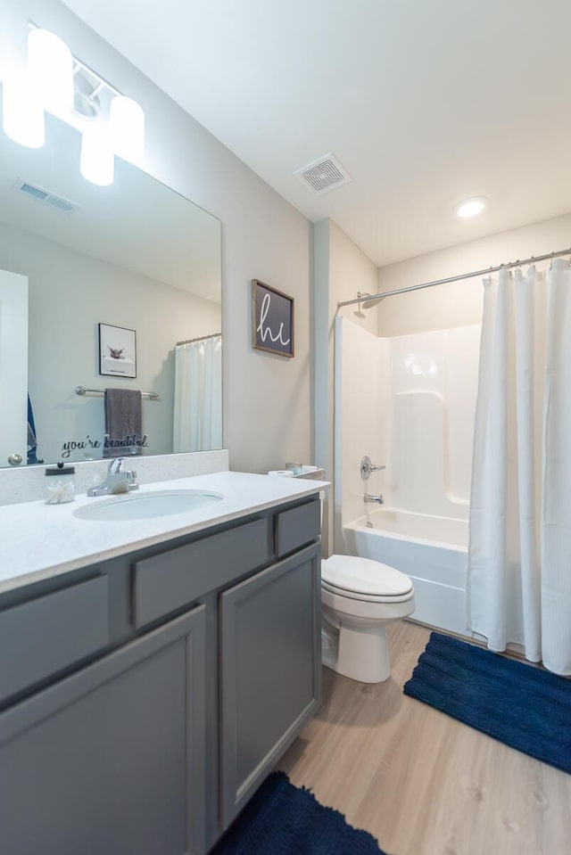 133 Kirkstall Way, Georgetown, KY 40324 - full bathroom featuring vanity, wood finished floors, toilet, and shower / bath combination with curtain