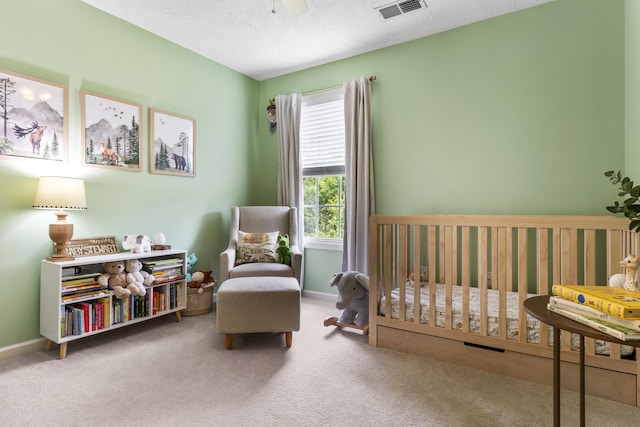 481 Alderbrook Way, Lexington, KY 40515 - bedroom with carpet floors, a crib, and a textured ceiling