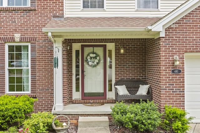 481 Alderbrook Way, Lexington, KY 40515 - property entrance featuring a shingled roof, brick siding, a garage, and a porch