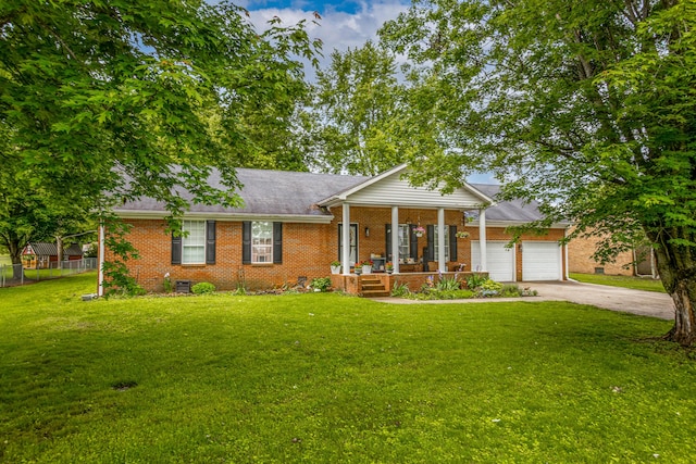 53 Douglas Ave, Stanford, KY 40484 - view of front of home featuring a porch, brick siding, a garage, and concrete driveway
