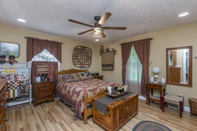 53 Douglas Ave, Stanford, KY 40484 - bedroom with light wood finished floors, a textured ceiling, a ceiling fan, and recessed lighting