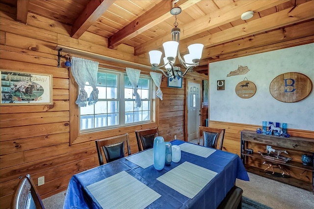 116 Hickory Lick Rd, Richmond, KY 40475 - dining area with wooden walls, wooden ceiling with exposed beams, carpet flooring, and a chandelier