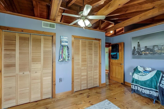 116 Hickory Lick Rd, Richmond, KY 40475 - bedroom with two closets, wood ceiling, hardwood / wood-style flooring, baseboards, and ceiling fan