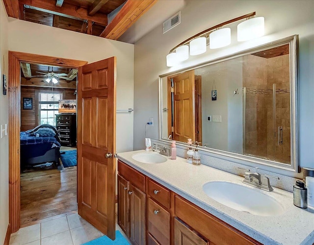 116 Hickory Lick Rd, Richmond, KY 40475 - ensuite bathroom featuring tile patterned flooring, double vanity, a stall shower, wooden ceiling with exposed beams, and a ceiling fan