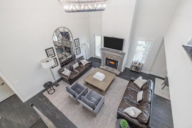 2605 Lucca Pl, Lexington, KY 40509 - living area with a high ceiling, a brick fireplace, healthy amount of natural light, and wood finished floors