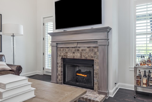 2605 Lucca Pl, Lexington, KY 40509 - living area featuring baseboards, wood finished floors, and a fireplace