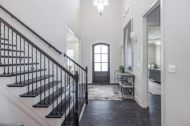 2605 Lucca Pl, Lexington, KY 40509 - foyer entrance with a high ceiling, dark wood finished floors, baseboards, and stairs
