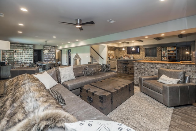 2605 Lucca Pl, Lexington, KY 40509 - living area with ceiling fan, recessed lighting, stairway, wood finished floors, and bar