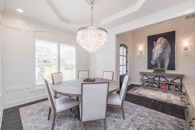 2605 Lucca Pl, Lexington, KY 40509 - dining space with dark wood-type flooring, crown molding, a chandelier, a tray ceiling, and baseboards