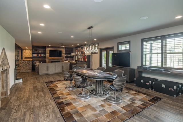 2605 Lucca Pl, Lexington, KY 40509 - dining area with ceiling fan, recessed lighting, a large fireplace, and wood finished floors
