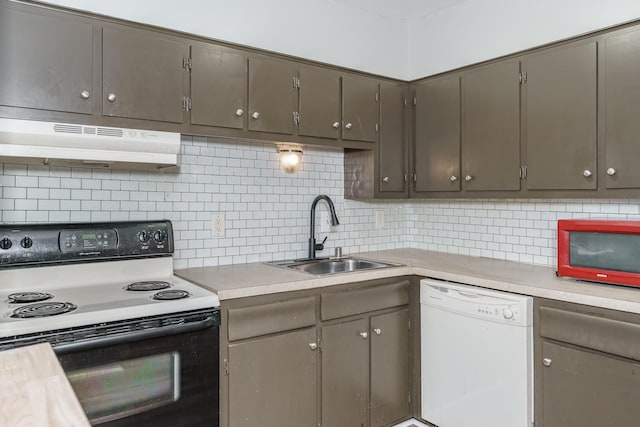 1092 Armstrong Mill Rd Unit A, Lexington, KY 40517 - kitchen with electric stove, dishwasher, under cabinet range hood, a sink, and light countertops