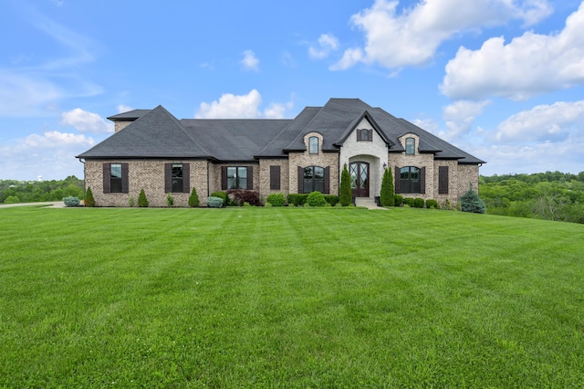 1408 Champion Way, Richmond, KY 40475 - french country home featuring a front lawn, brick siding, and roof with shingles