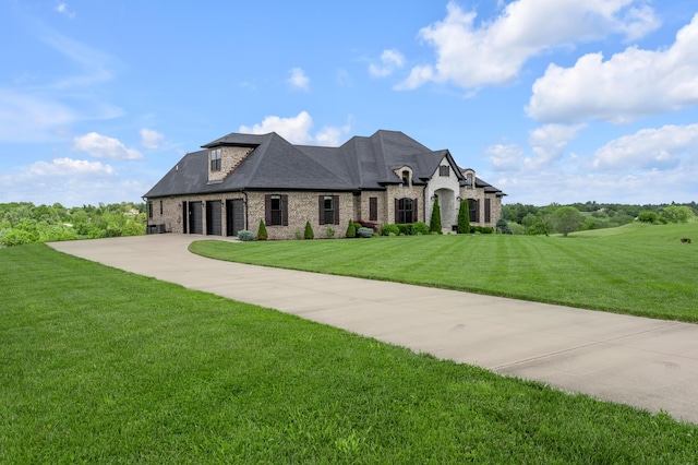 1408 Champion Way, Richmond, KY 40475 - french provincial home featuring a front yard, brick siding, driveway, and a shingled roof