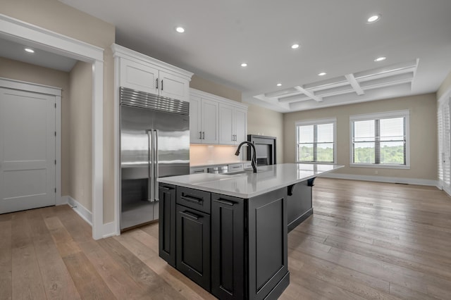 1408 Champion Way, Richmond, KY 40475 - kitchen featuring stainless steel built in refrigerator, coffered ceiling, recessed lighting, white cabinetry, and light countertops