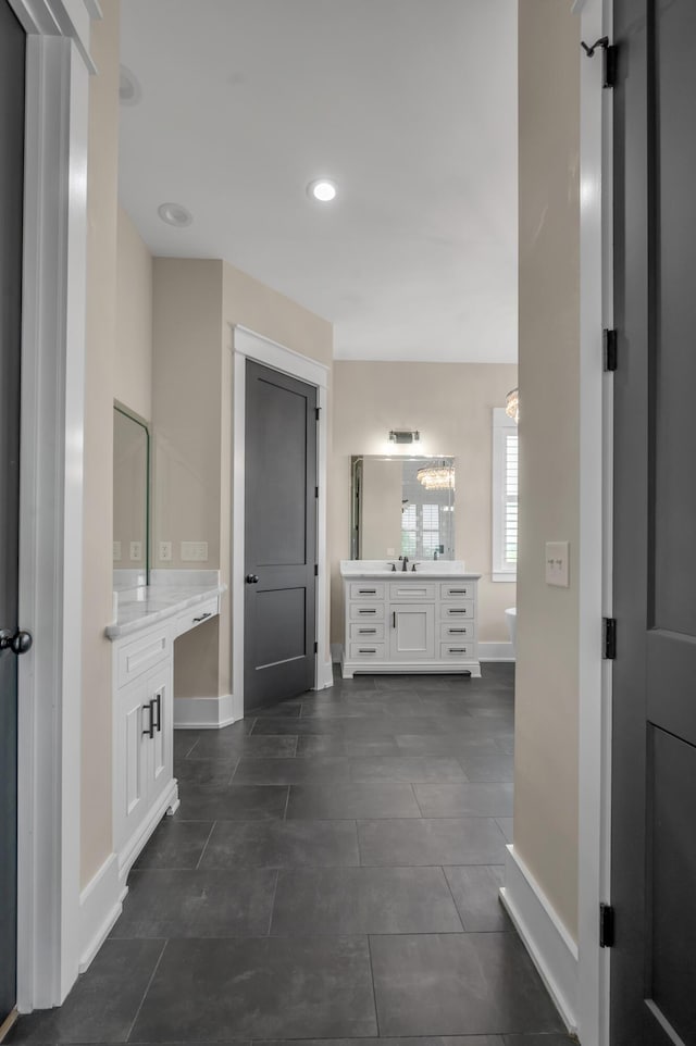 1408 Champion Way, Richmond, KY 40475 - bathroom featuring two vanities, baseboards, recessed lighting, and tile patterned floors