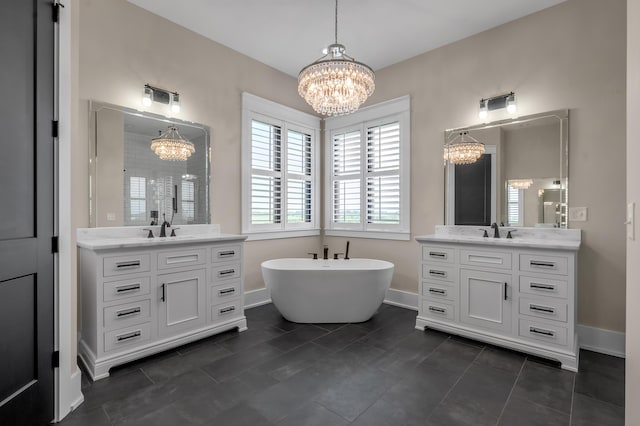 1408 Champion Way, Richmond, KY 40475 - bathroom featuring a chandelier, two vanities, a soaking tub, and baseboards