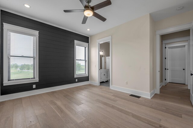 1408 Champion Way, Richmond, KY 40475 - unfurnished bedroom with baseboards, light wood finished floors, recessed lighting, wood walls, and a ceiling fan