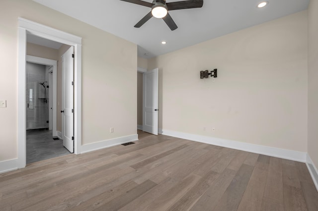 1408 Champion Way, Richmond, KY 40475 - unfurnished room featuring light wood finished floors, baseboards, ceiling fan, and recessed lighting
