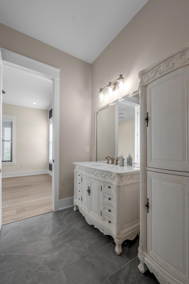 1408 Champion Way, Richmond, KY 40475 - bathroom with vanity, baseboards, and marble look tiles