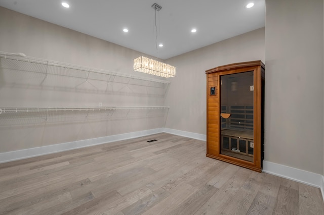 1408 Champion Way, Richmond, KY 40475 - unfurnished dining area featuring baseboards, wood finished floors, recessed lighting, and a chandelier