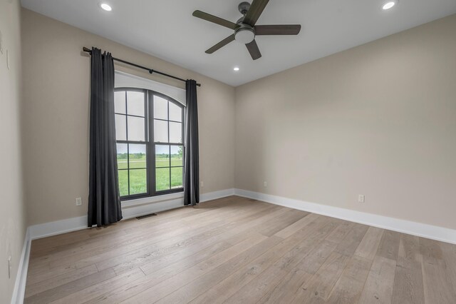 1408 Champion Way, Richmond, KY 40475 - empty room featuring light wood-style floors, ceiling fan, recessed lighting, and baseboards