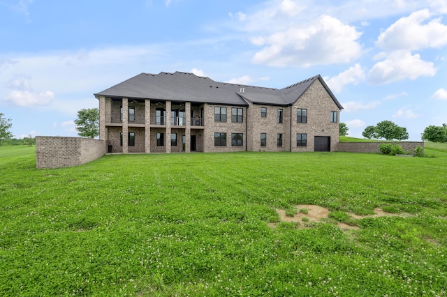 1408 Champion Way, Richmond, KY 40475 - back of house featuring a balcony, a lawn, and brick siding