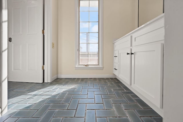 406 N Main St, Somerset, KY 42501 - foyer with baseboards and brick floors