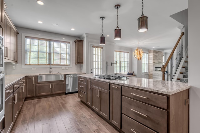 2131 Patchen Lake Ln, Lexington, KY 40505 - kitchen featuring a sink, appliances with stainless steel finishes, healthy amount of natural light, hardwood / wood-style flooring, and recessed lighting