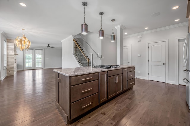 2131 Patchen Lake Ln, Lexington, KY 40505 - kitchen featuring ceiling fan, baseboards, dark wood-style floors, crown molding, and hanging light fixtures