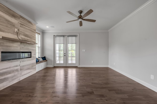 2131 Patchen Lake Ln, Lexington, KY 40505 - unfurnished living room featuring a tiled fireplace, ornamental molding, ceiling fan, baseboards, and dark wood-style flooring
