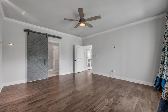 2131 Patchen Lake Ln, Lexington, KY 40505 - unfurnished bedroom with a barn door, wood finished floors, ornamental molding, baseboards, and ceiling fan