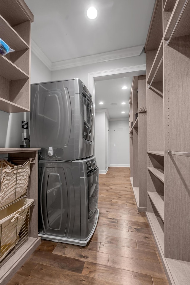 2131 Patchen Lake Ln, Lexington, KY 40505 - walk in closet with stacked washing machine and dryer and wood-type flooring
