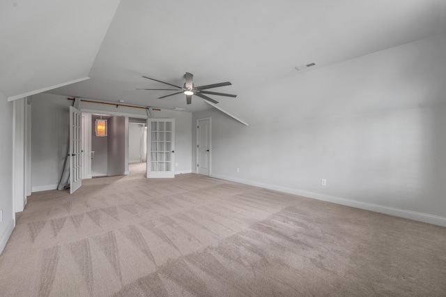 2131 Patchen Lake Ln, Lexington, KY 40505 - unfurnished room with light colored carpet, a ceiling fan, lofted ceiling, and baseboards