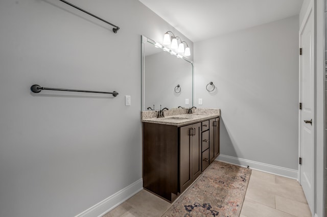 2131 Patchen Lake Ln, Lexington, KY 40505 - full bathroom featuring double vanity, baseboards, and tile patterned floors